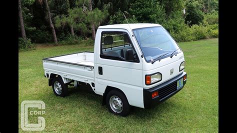 mini on flatbed truck